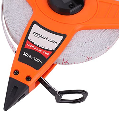Amazon Basics Open Reel Fiberglass Measuring Tape, Versatile, Reliable, Shock-Absorbing Handle, Inch/Metric Scale, Impact Resistant Shell, 100-feet (30-Meters) by 1/2-Inch, Orange