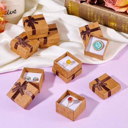 Craftdady 12 Pack Square Ring Jewelry Boxes 1.59 x 1.59x 1.02 Inch Cardboard Earring Necklace Pendant Present Jewelry Boxes with Bowknot Small Packing Boxes for Bracelet Jewelry Display (Light Brown) - color: Light Brown