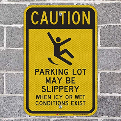SmartSign 18 x 12 inch “Caution - Parking Lot May Be Slippery When Icy Or Wet Conditions Exist” Metal Sign, 63 mil Aluminum, 3M Laminated Diamond Grade Reflective Material, Black and Yellow, USA-Made - color: 12" x 18" DG Reflective Aluminum